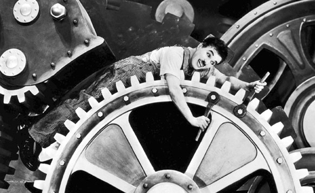 De la eficacia a la eficiencia Miquel Lacasta fotograma de la conocidísima película Tiempos Modernos (1936